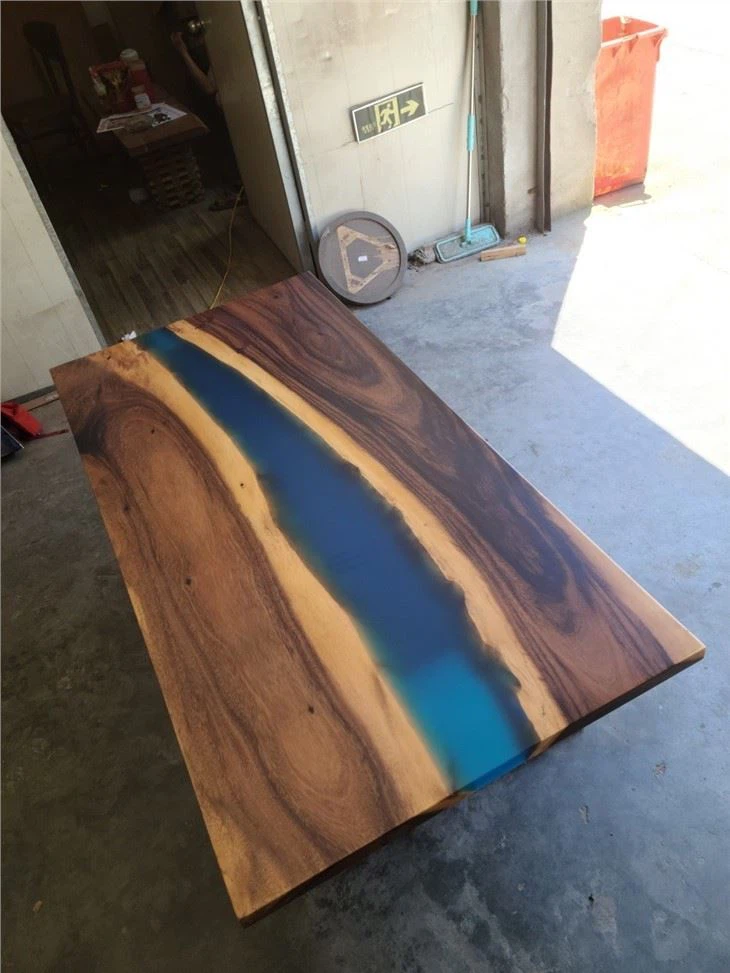 China Electric Lift Resin River Table